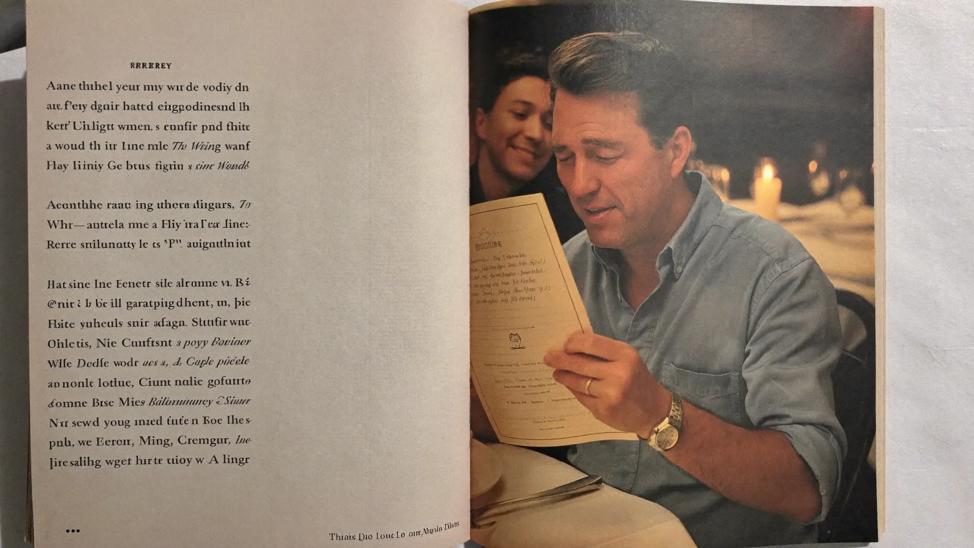 A man at a candlelit restaurant table holding the menu at full arm's length